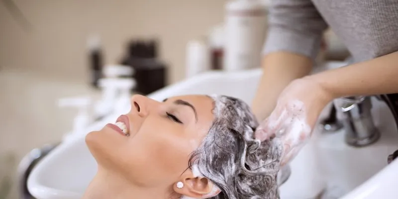 Woman washing hair.width 800 11zon